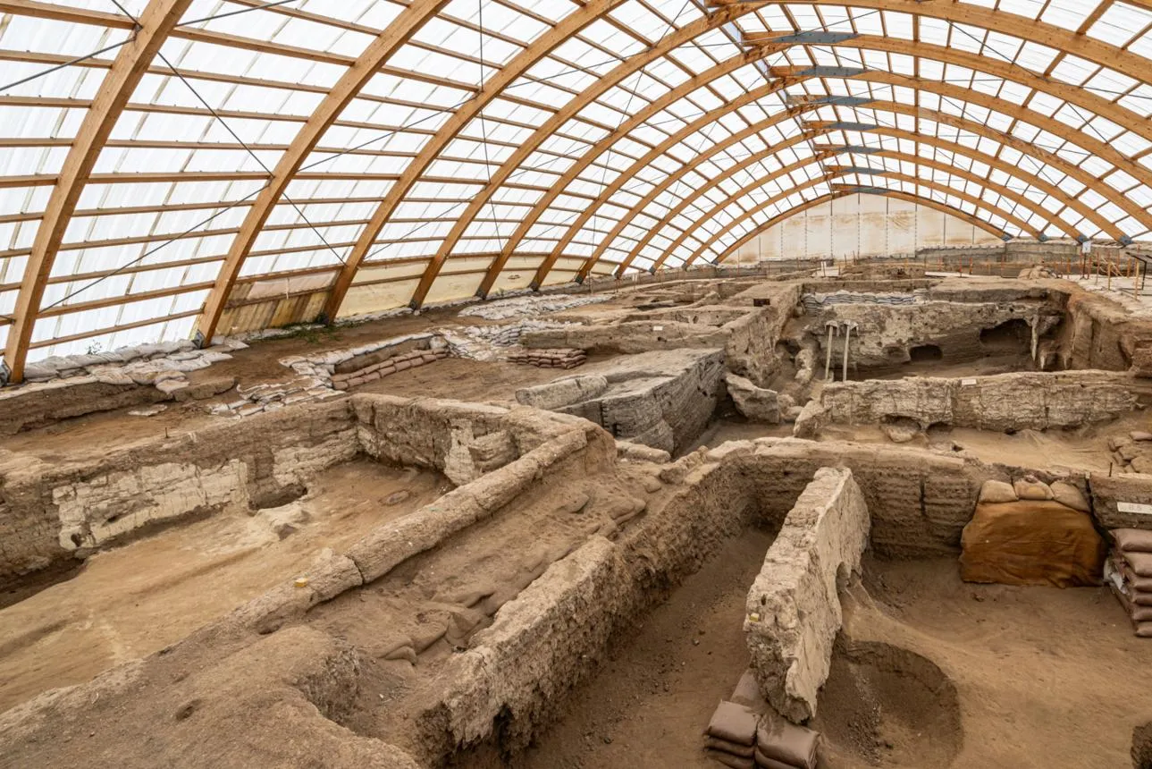 Excavated mud-brick houses of Çatalhöyük under the protective shelter
