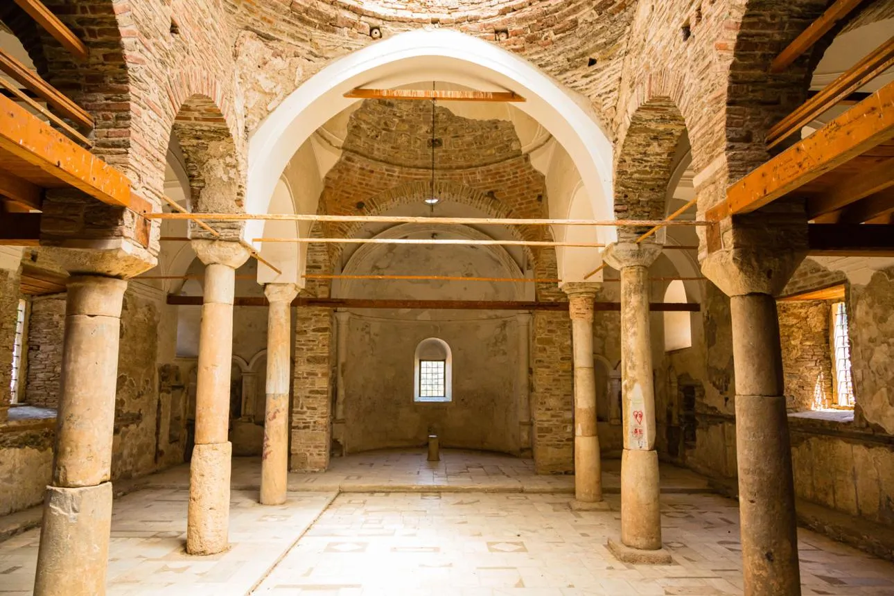 Columns and brick arches inside the Church of St John the Baptist in Şirince
