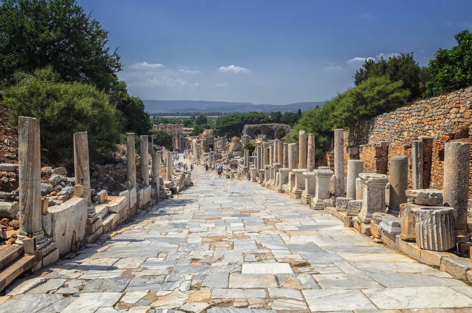 Columns and statues lining the marble Curetes Street in Ephesus