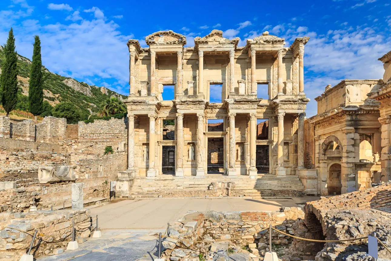 The façade of the Library of Celsus in Ephesus under a blue sky