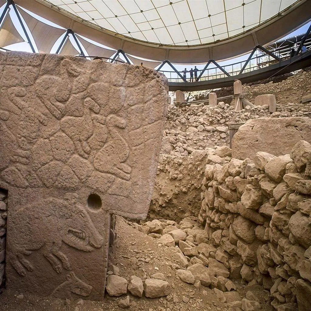 A T-shaped pillar at Göbekli Tepe carved with animal reliefs