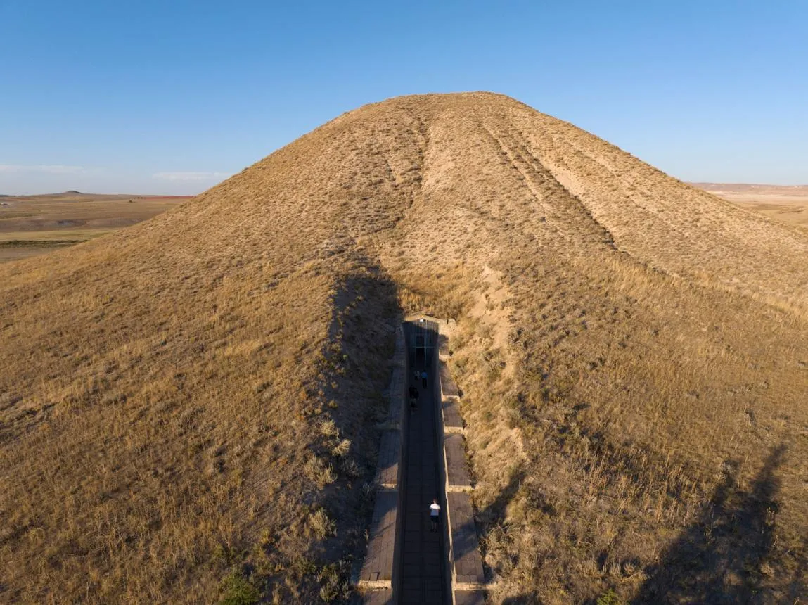 The great grass-covered burial mound of Gordion with its entrance tunnel