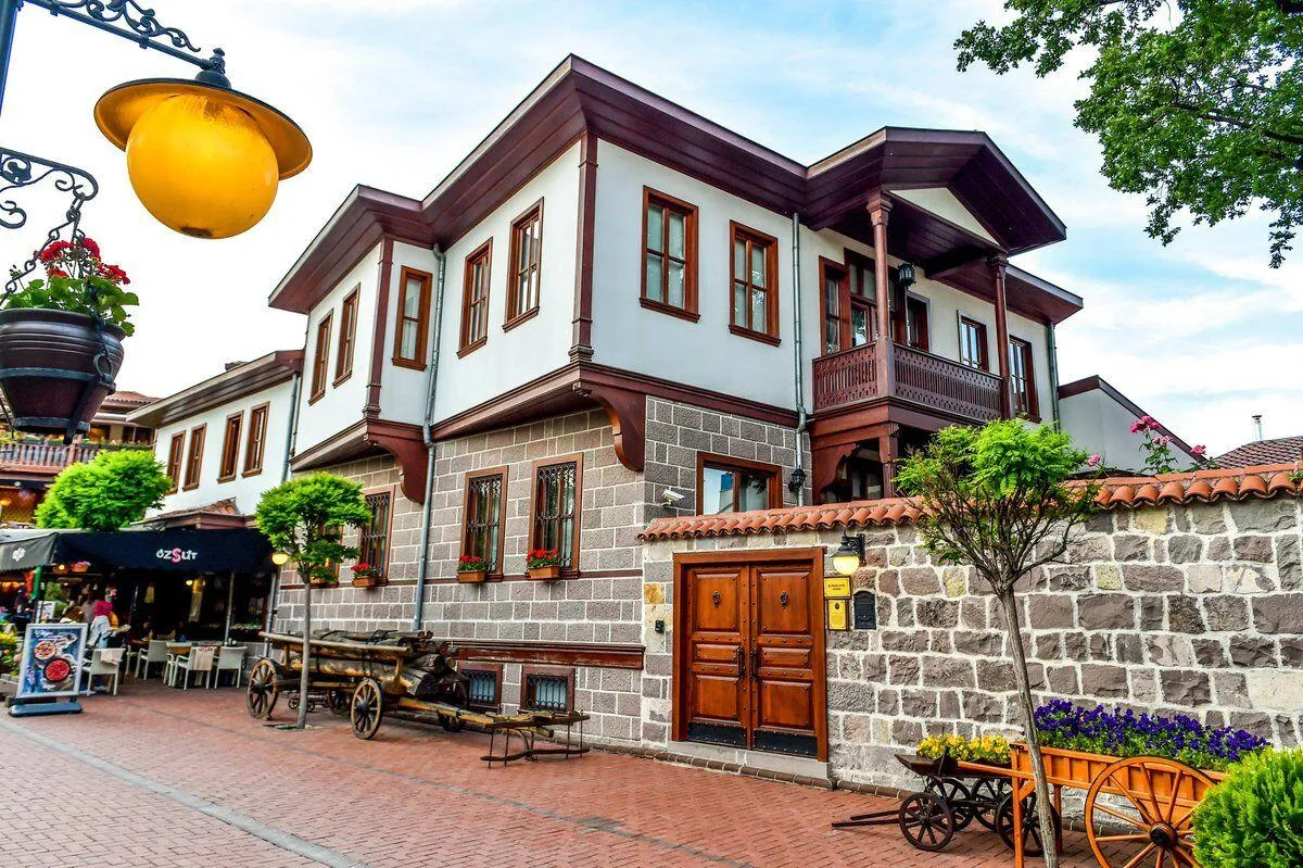 A restored white and red Ottoman house with a café in Hamamönü