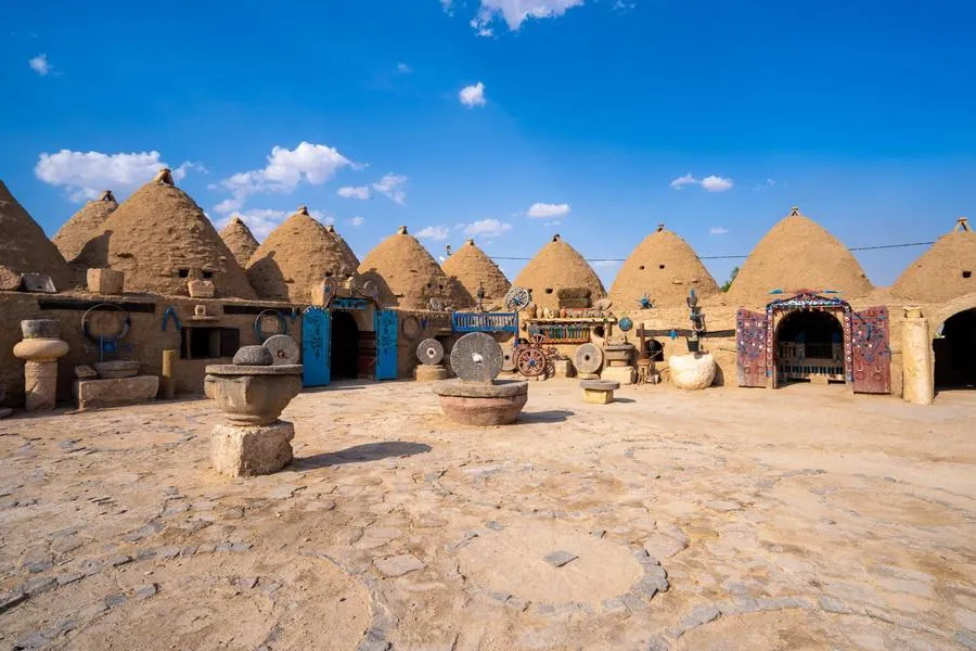 A courtyard of cone-shaped beehive houses in Harran