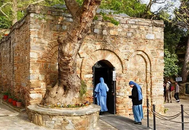 Pilgrims at the door of the House of the Virgin Mary