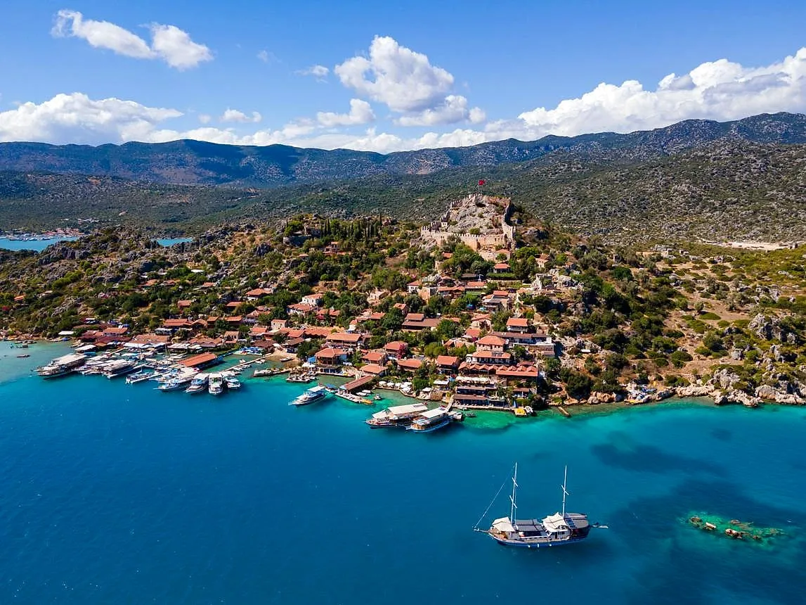 Kaleköy and its castle above the blue bay of Kekova