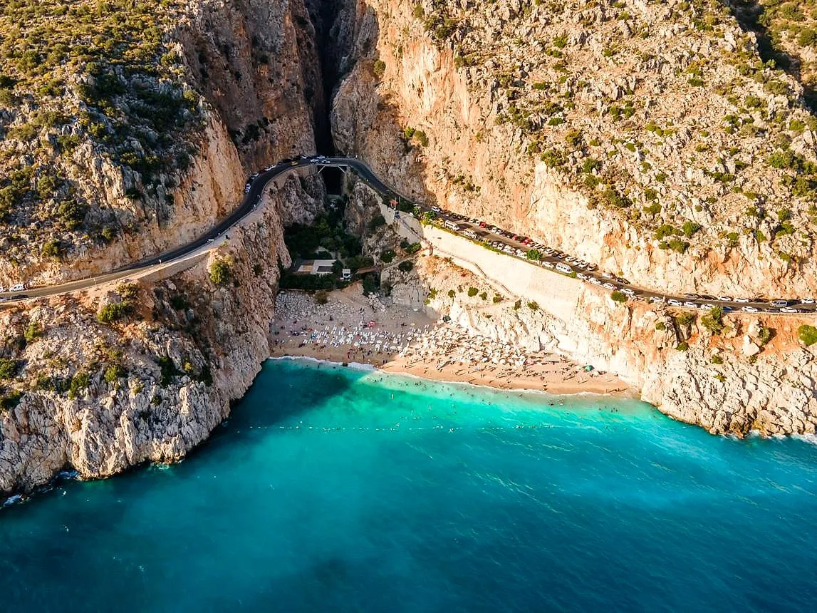 Kaputaş beach and its turquoise water below the cliffs and coast road