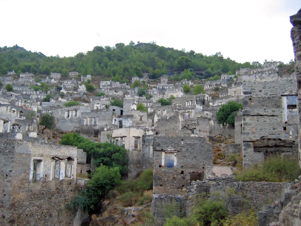 Abandoned stone houses on the hillside of Kayaköy