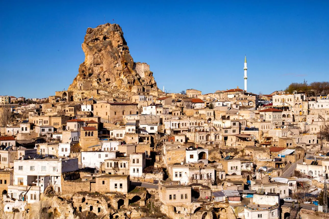 Ortahisar rock citadel above the stone houses of the town