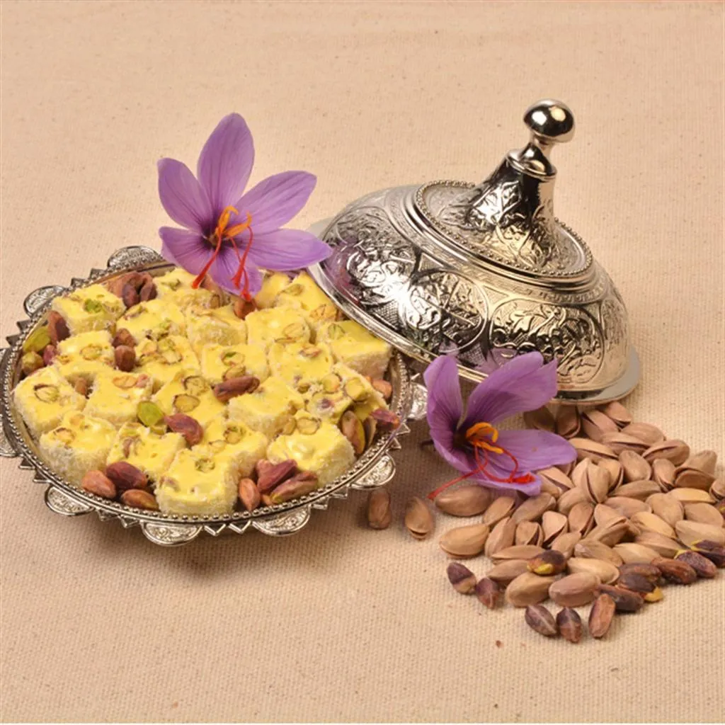 Saffron Turkish delight with pistachios and purple crocus flowers