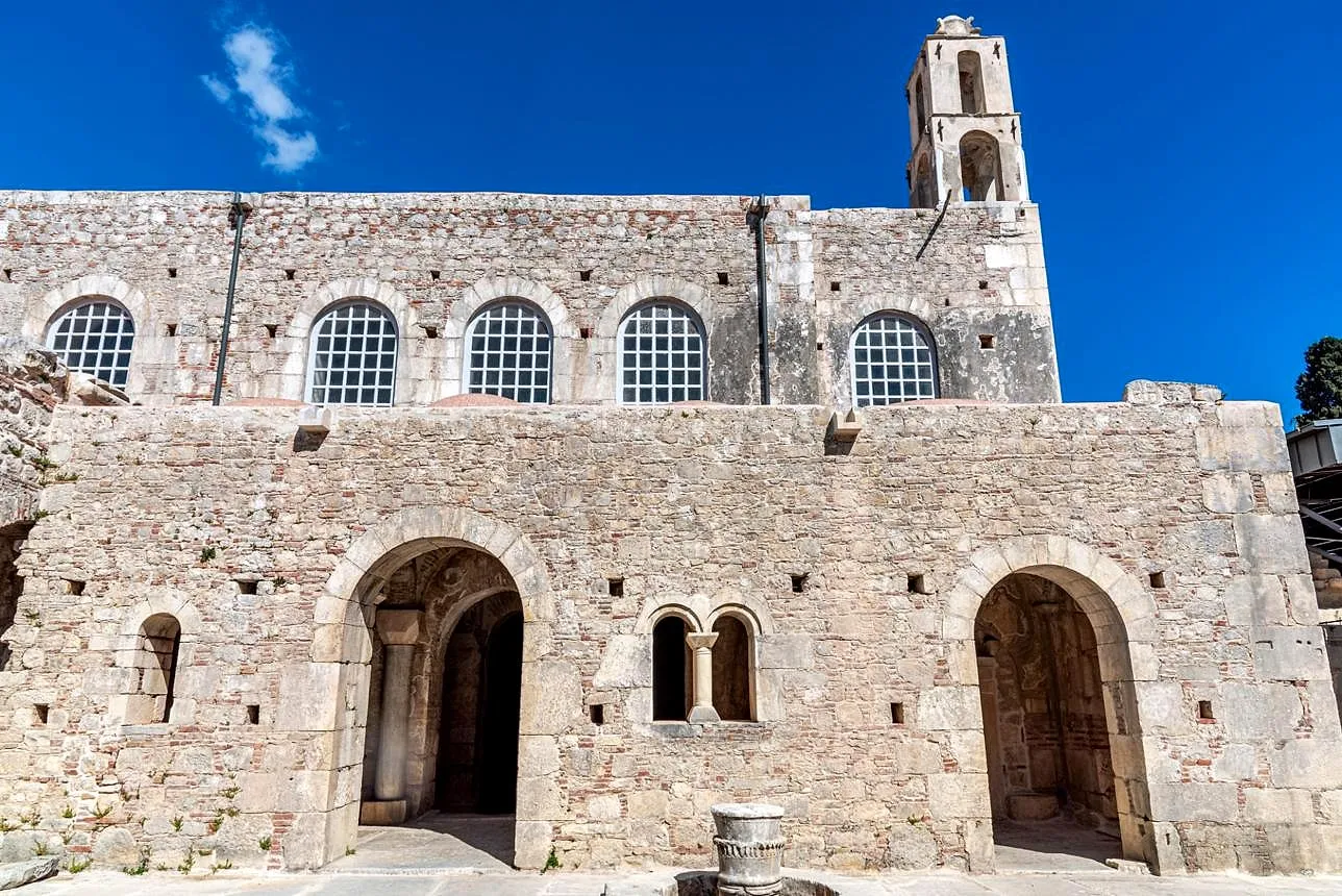 The stone bell tower and facade of the Church of St. Nicholas