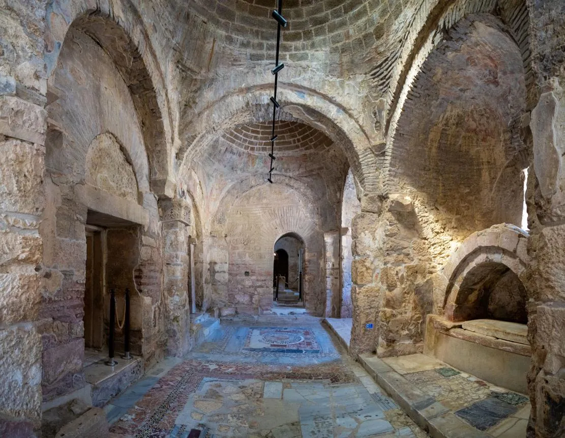 Stone arches and mosaic floors inside the Church of St Nicholas in Demre