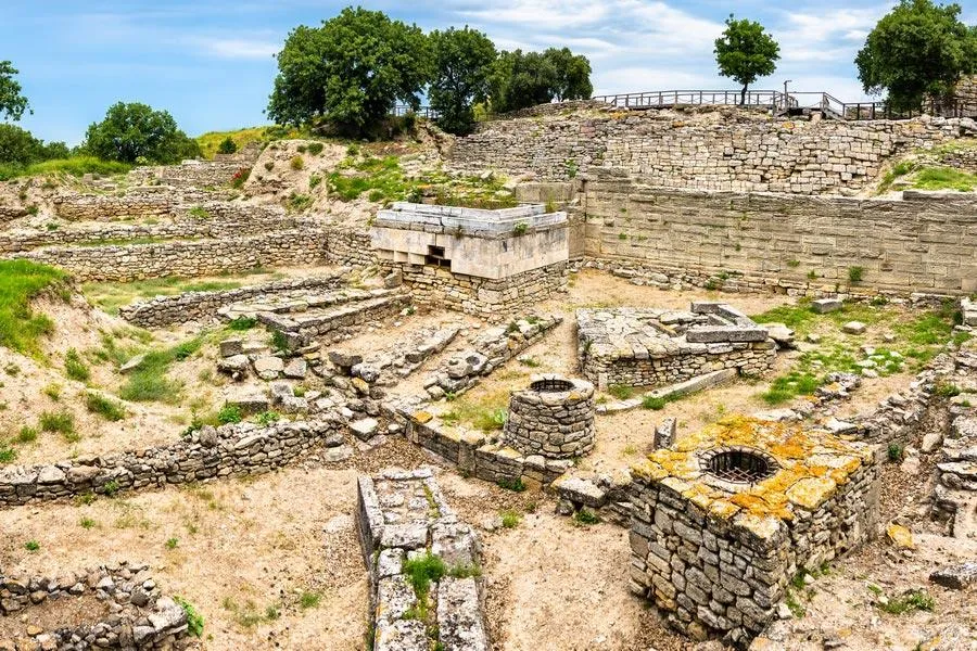 Stone foundations and walls of the excavated layers of ancient Troy