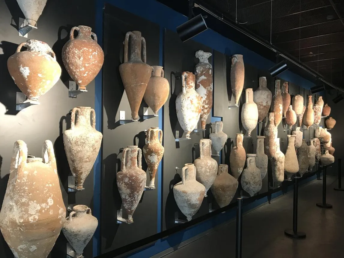 Rows of ancient amphorae recovered from shipwrecks in the Museum of Underwater Archaeology